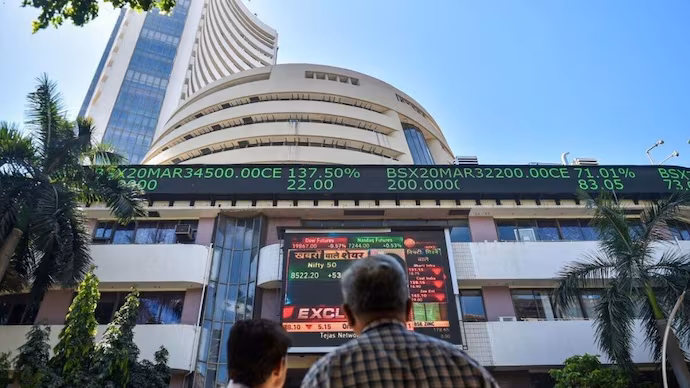 Sensex falls over 450 points, Nifty settles lower as IT stocks tumble
